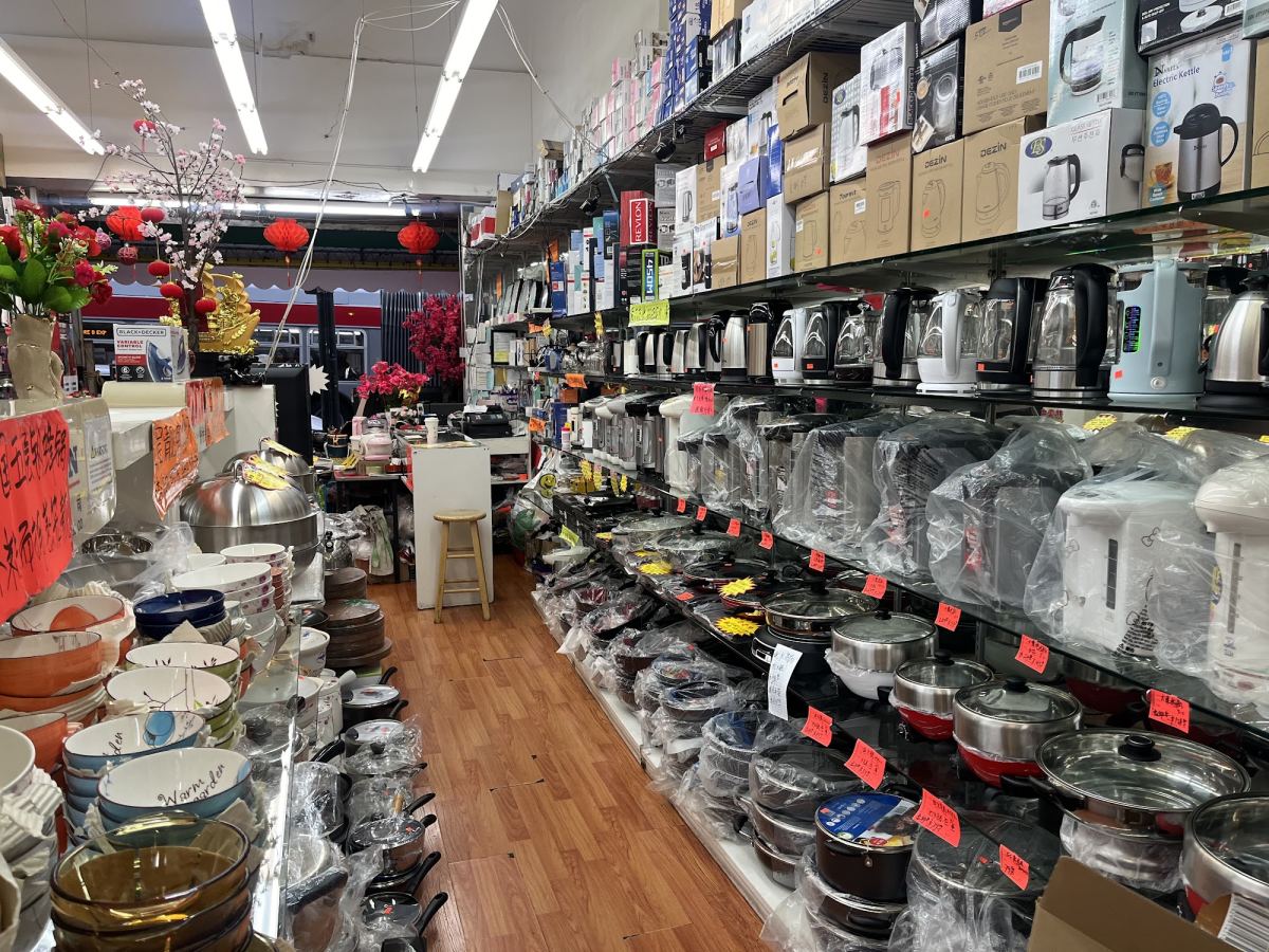 Aisle of electric kettles, hot water dispensers and pots
